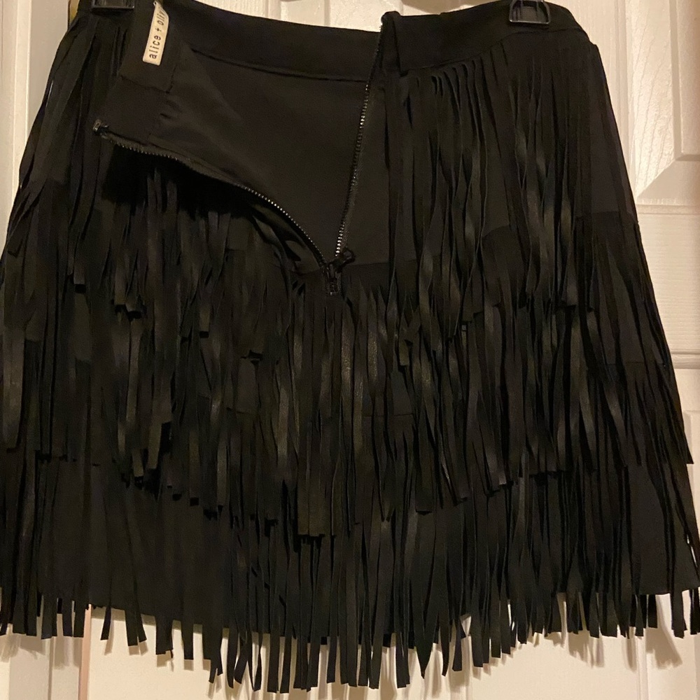 Never worn!  Excellent Condition Black Fringed